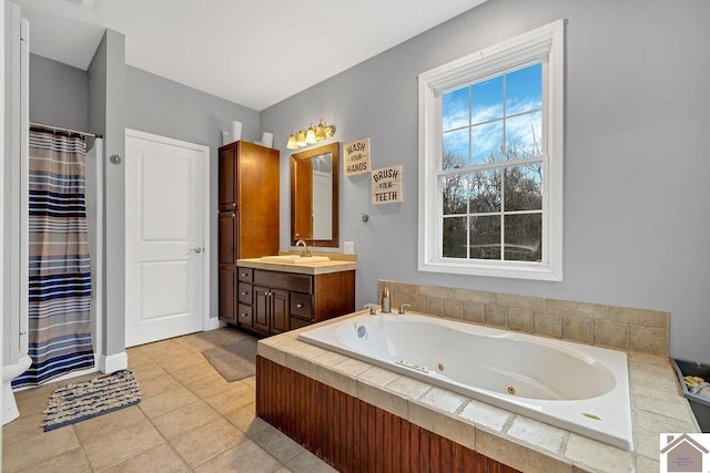 bathroom featuring vanity and shower with separate bathtub