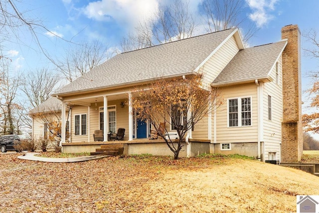 back of property with covered porch