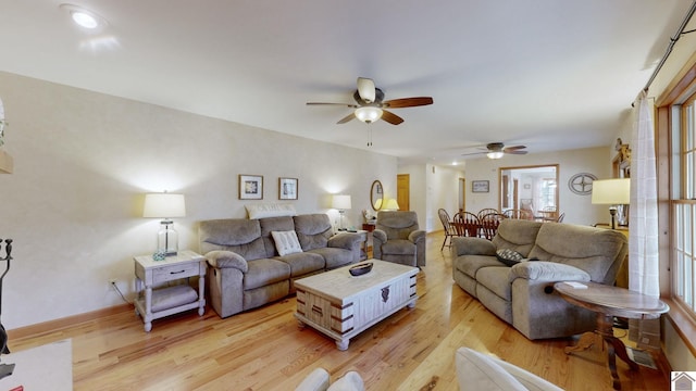 living room with light hardwood / wood-style flooring