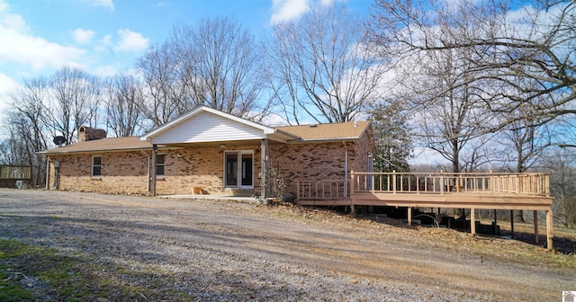 view of front of house featuring a wooden deck