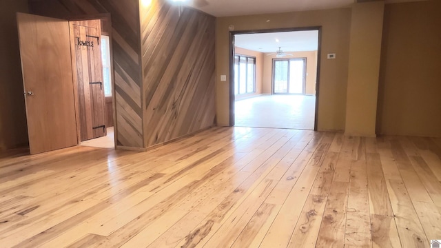 empty room with light hardwood / wood-style flooring