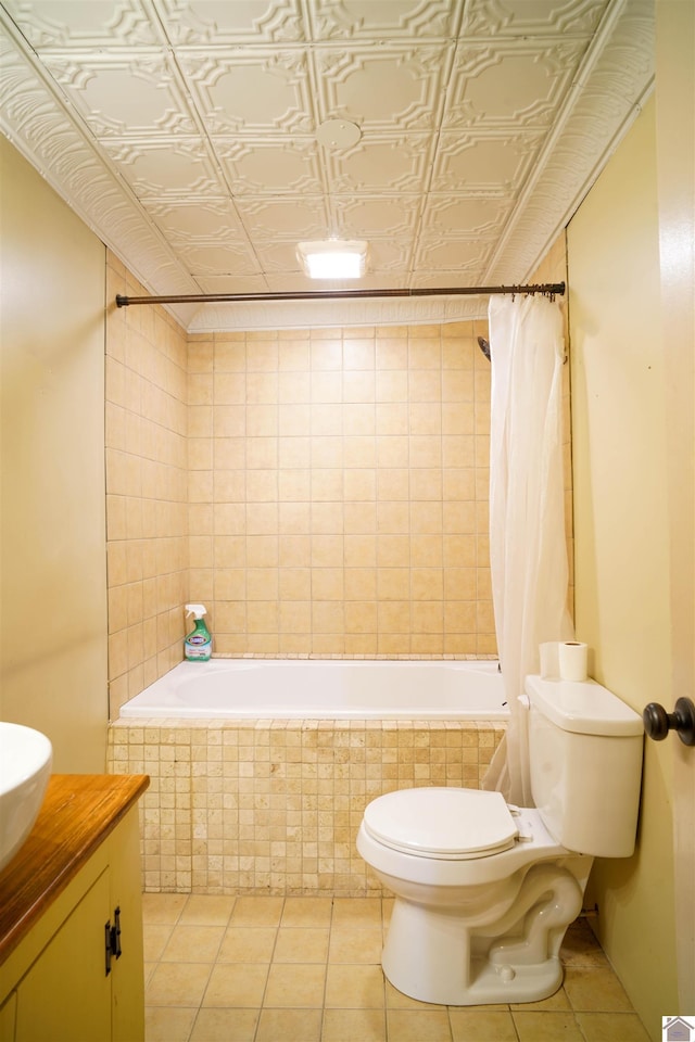 bathroom featuring vanity, toilet, and tile patterned flooring