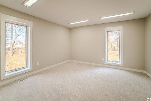 view of carpeted spare room