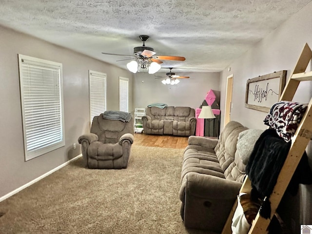 carpeted living room featuring a textured ceiling