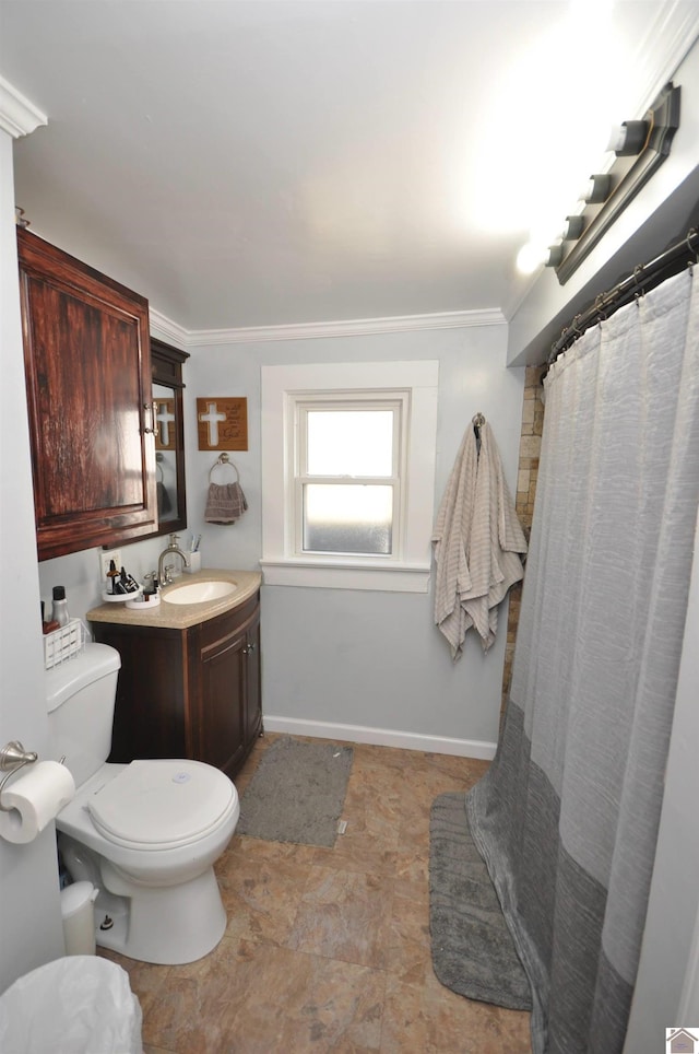 bathroom with vanity, crown molding, curtained shower, and toilet