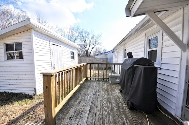 wooden terrace with grilling area