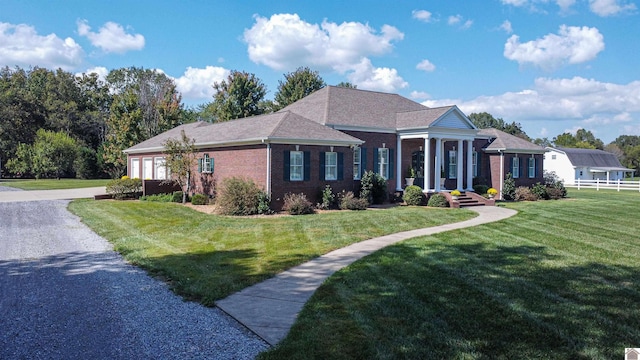 view of front of house with a front lawn