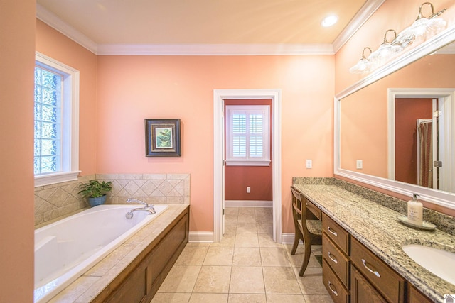 bathroom featuring tile patterned flooring, vanity, ornamental molding, and a relaxing tiled tub