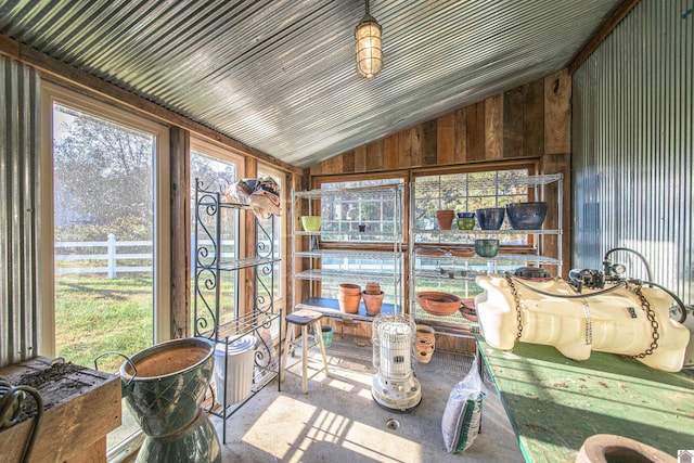 sunroom / solarium with plenty of natural light and vaulted ceiling