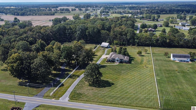 birds eye view of property featuring a rural view