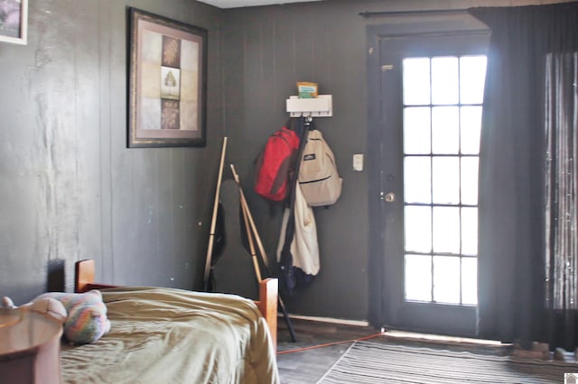 bedroom featuring dark hardwood / wood-style flooring