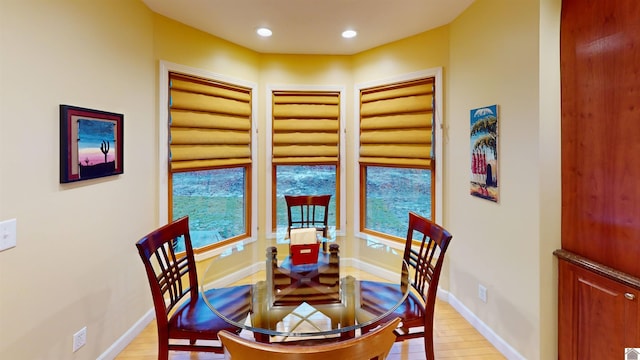 dining area featuring light wood-type flooring