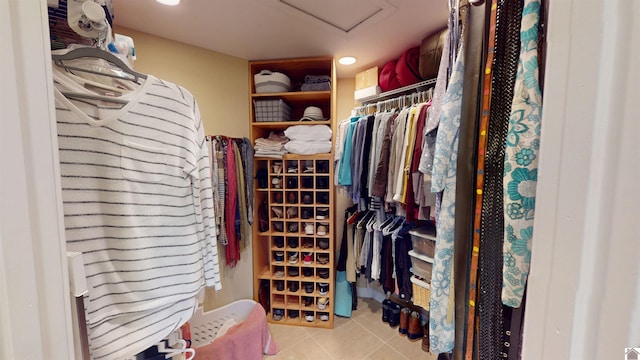 walk in closet featuring light tile patterned floors