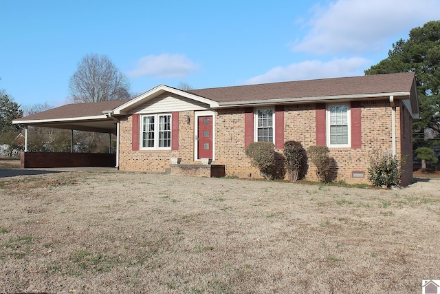 ranch-style house with a carport and a front yard