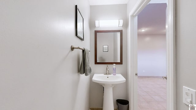 bathroom with tile patterned flooring