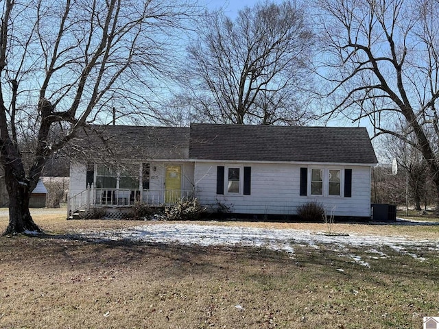 ranch-style house with central AC unit and roof with shingles