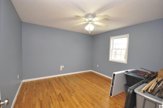 unfurnished room featuring light hardwood / wood-style floors and ceiling fan