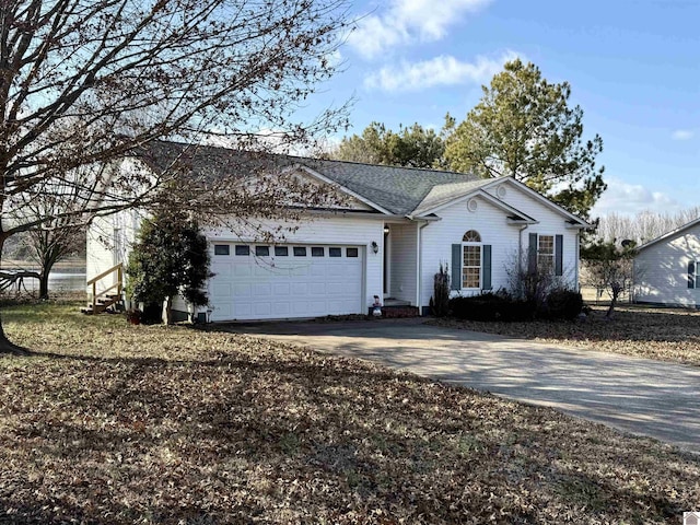 single story home with a garage