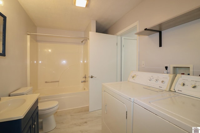 laundry room with sink and washer and clothes dryer