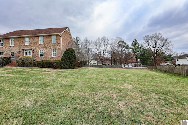 view of yard featuring fence