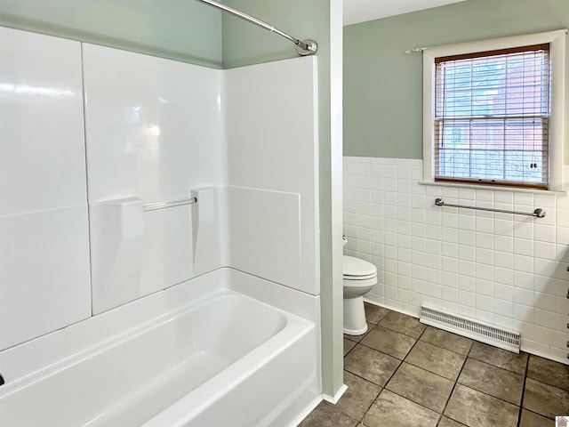 full bath featuring shower / bathtub combination, toilet, visible vents, tile walls, and tile patterned floors