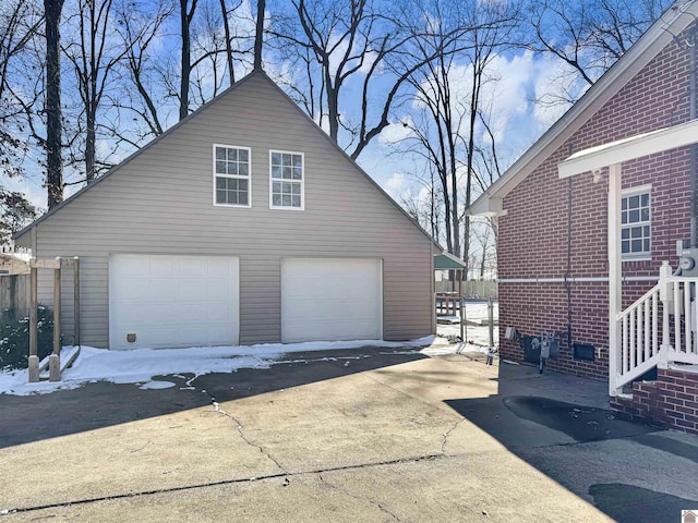 garage featuring fence