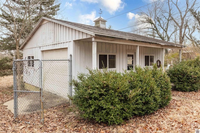 exterior space with fence and an outdoor structure