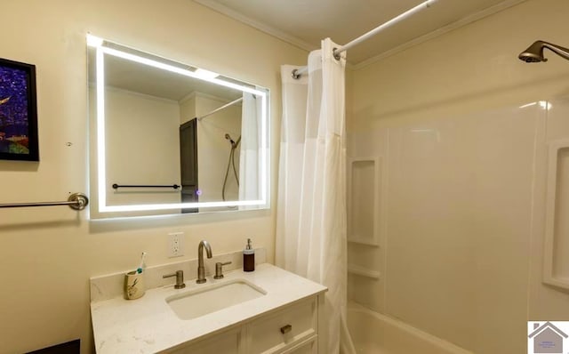 bathroom with shower / tub combo, vanity, and crown molding