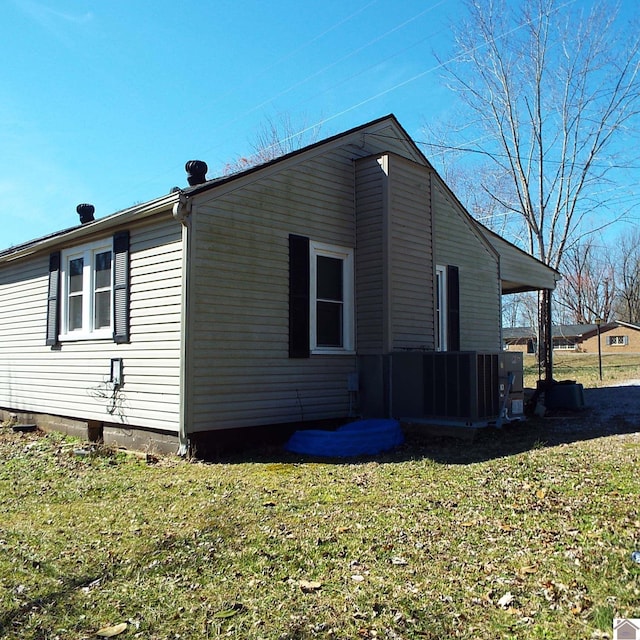 view of property exterior featuring a yard