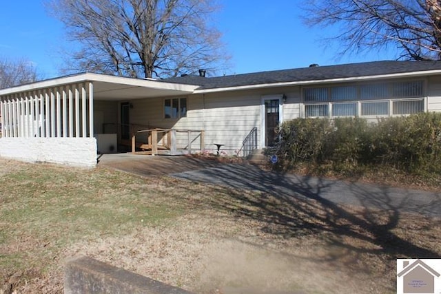 back of property featuring entry steps