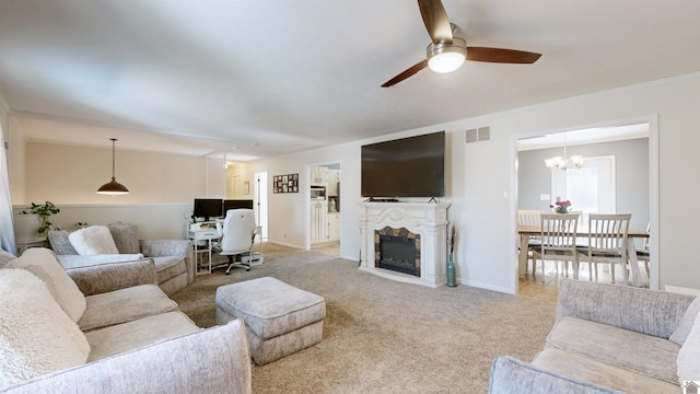 living area with visible vents, a fireplace with flush hearth, a ceiling fan, light carpet, and baseboards