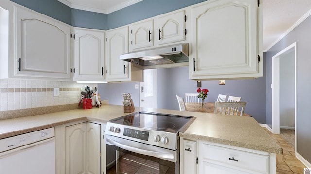 kitchen featuring dishwasher, light countertops, electric range, and under cabinet range hood