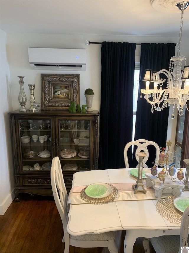 dining area with dark wood-style floors and a wall mounted AC