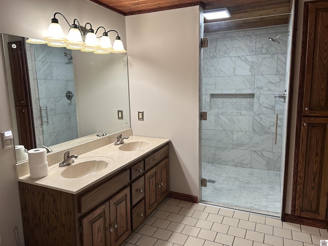 full bathroom featuring a stall shower and a sink