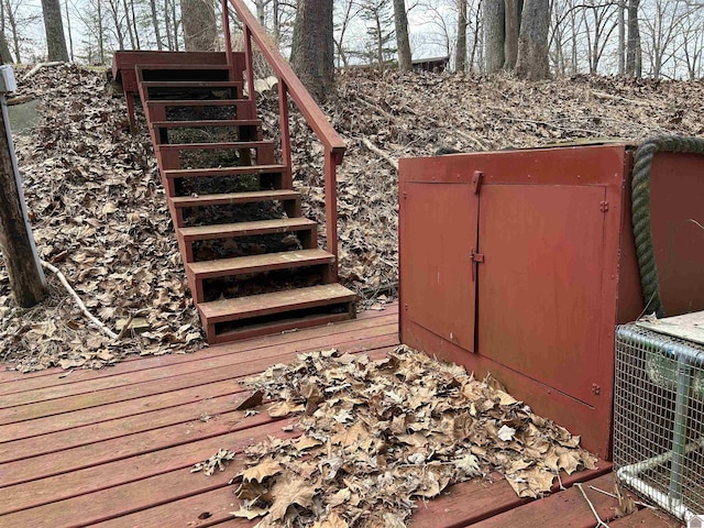 wooden deck featuring stairs