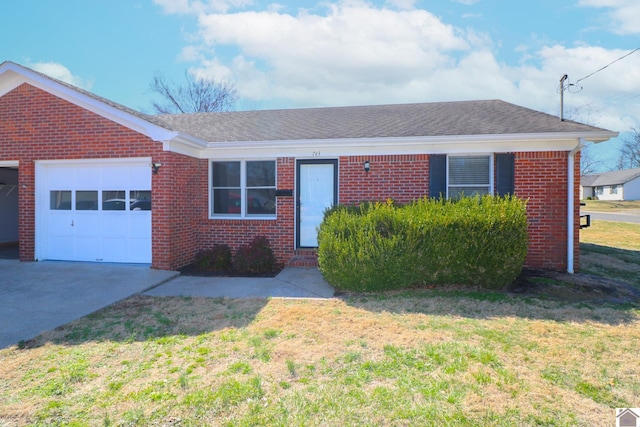 ranch-style home with an attached garage, a front lawn, concrete driveway, and brick siding