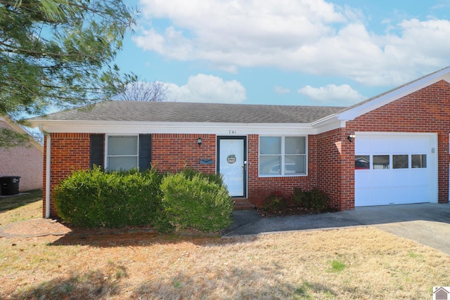 ranch-style house with driveway, brick siding, an attached garage, and a shingled roof