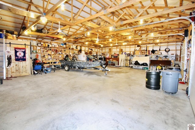 garage featuring a workshop area