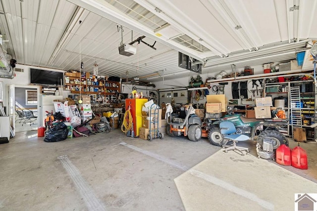 garage featuring a garage door opener