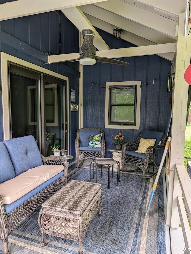 deck with an outdoor hangout area