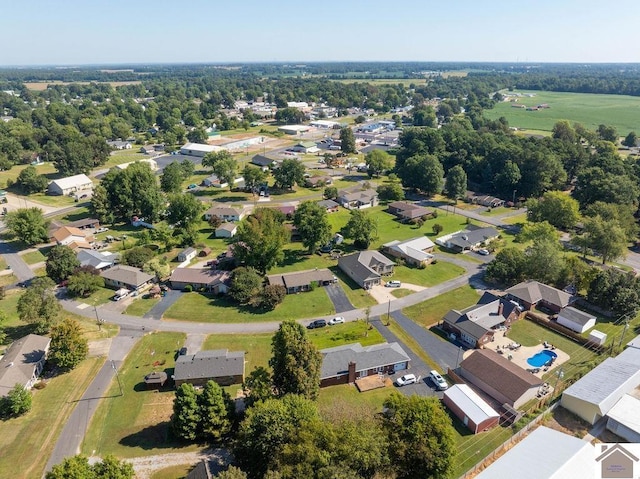 birds eye view of property with a residential view