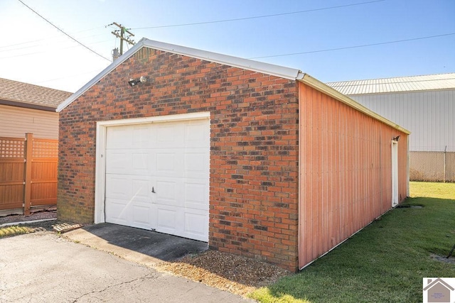 garage featuring fence