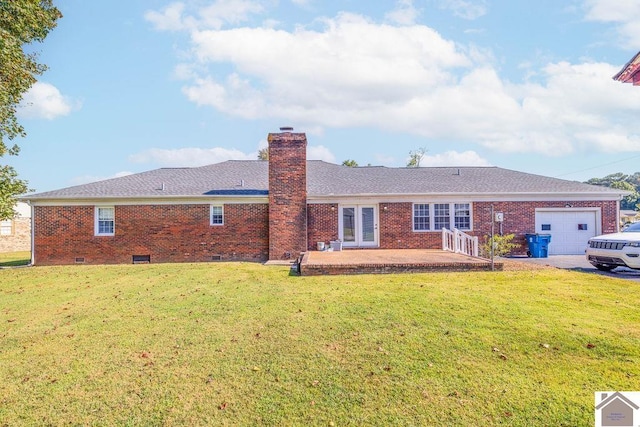 rear view of house featuring a chimney, brick siding, crawl space, and an attached garage