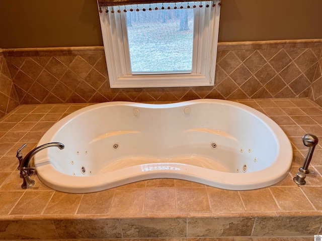 full bath featuring a jetted tub