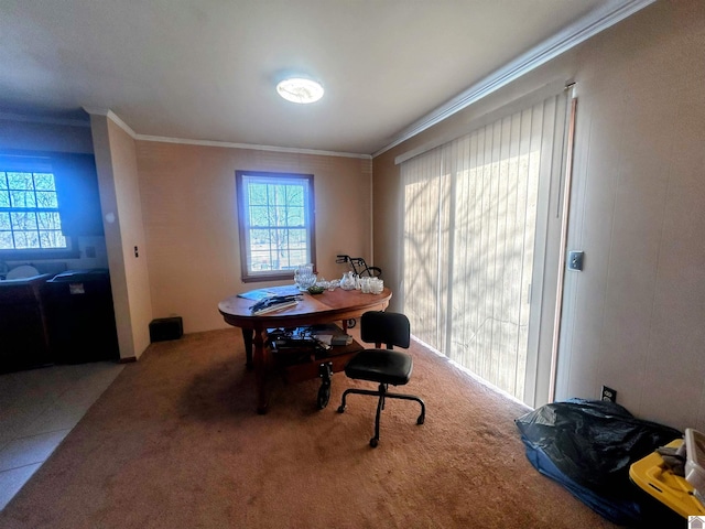 dining area featuring carpet, plenty of natural light, and crown molding