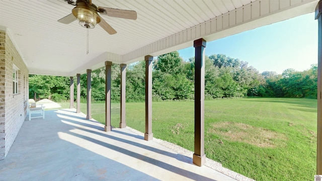 view of patio / terrace featuring ceiling fan