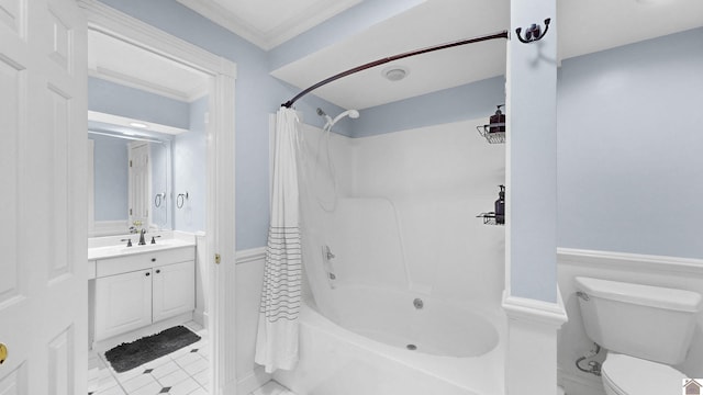 bathroom featuring toilet, shower / bathtub combination with curtain, ornamental molding, and vanity