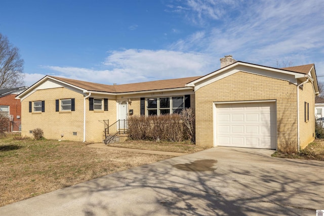 ranch-style home featuring brick siding, a chimney, an attached garage, crawl space, and driveway