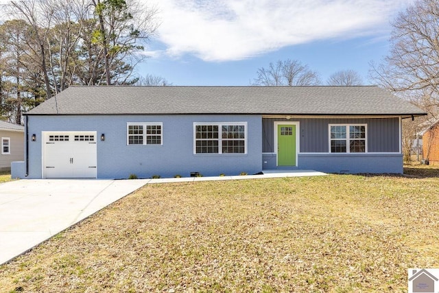 ranch-style house with an attached garage, a front lawn, concrete driveway, and brick siding