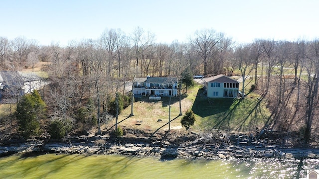 bird's eye view featuring a wooded view